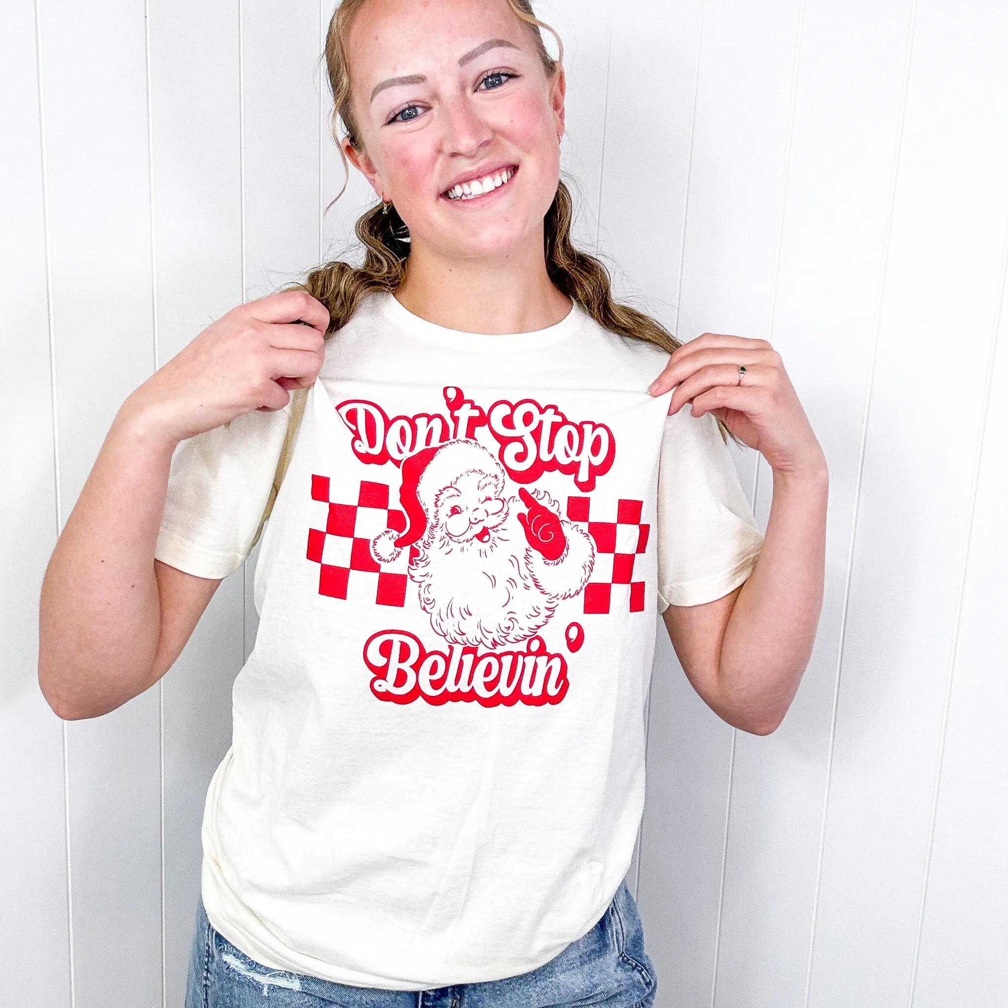 Don't Stop Believin' Santa Graphic Tee